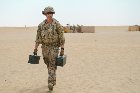 Soldier carrying ammunition