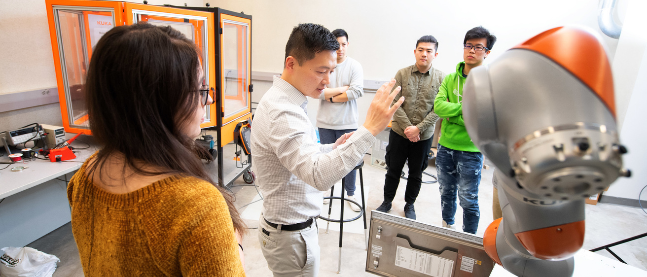Shaoping Xiao provides a Kuka robot demonstration