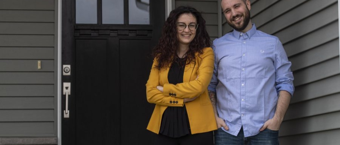 Caterina Lamuta and Venanzio Cichella in front of their home