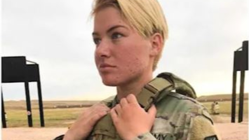 Female soldier wearing body armor
