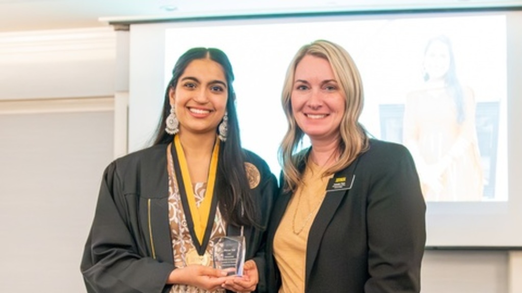 Bhavya Vats received the Academic & Scholarly Achievement Award from Amanda Thein, associate provost for Graduate and Professional Education and dean of the Graduate College
